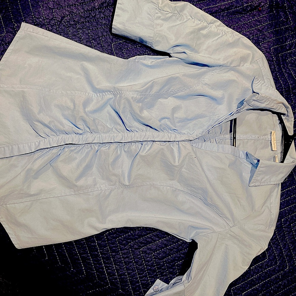 Ann Taylor Mid Sleeve Button Down.  Shirt runs small.  Color is baby blue.